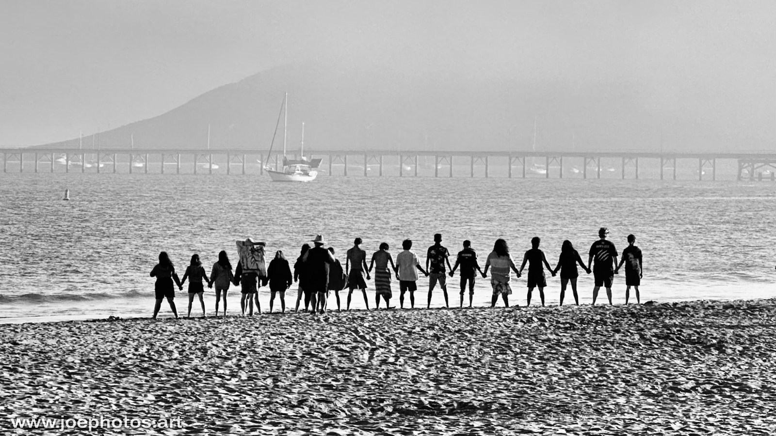 Monochrome beach people togehter.